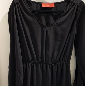 Brand Aikra dress size medium color black long sleeves with slit from shoulder